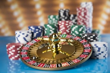 Live dealer hosting Treasures Aztec table with multi-camera HD feed
